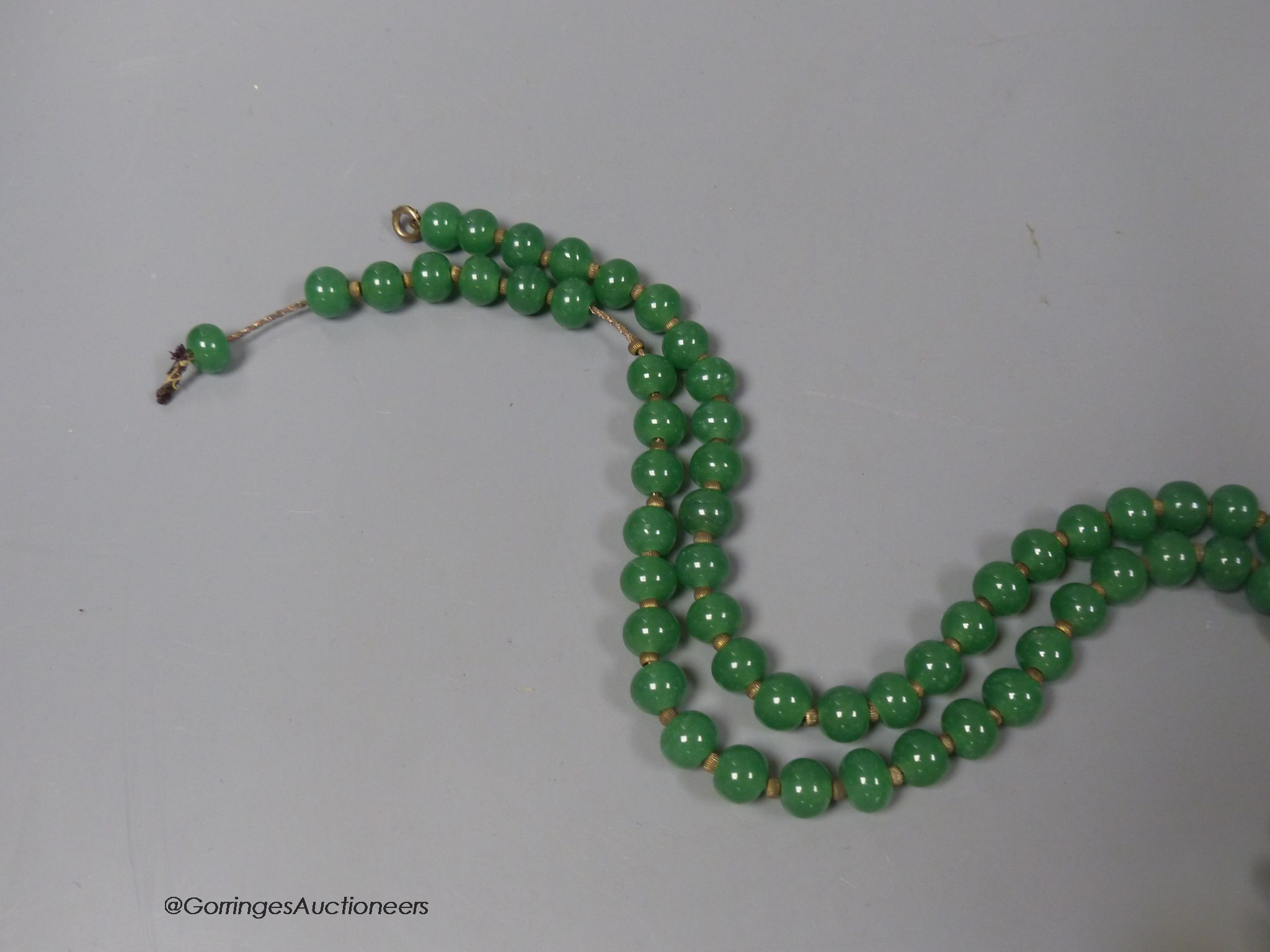 A single strand simulated jade bead necklace, 114cm.